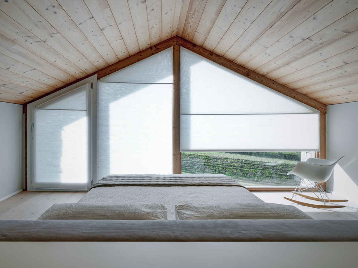 An insanely beautiful bedroom "inside" the Alps in Italy | Archiobjects
