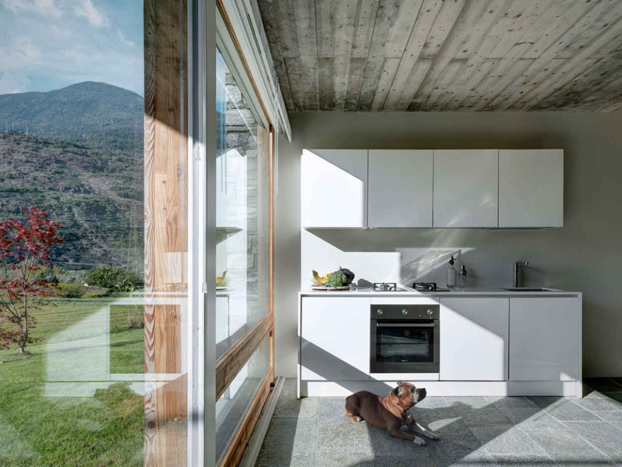 An insanely beautiful bedroom "inside" the Alps in Italy | Archiobjects